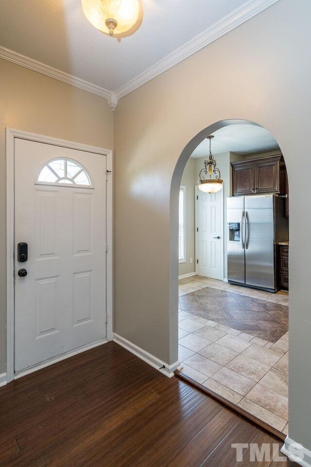 2905 Alder Ridge Lane Raleigh, NC 27603 - Photo 2 of 26 Beautiful bamboo floors greet you as you enter this lovely home.