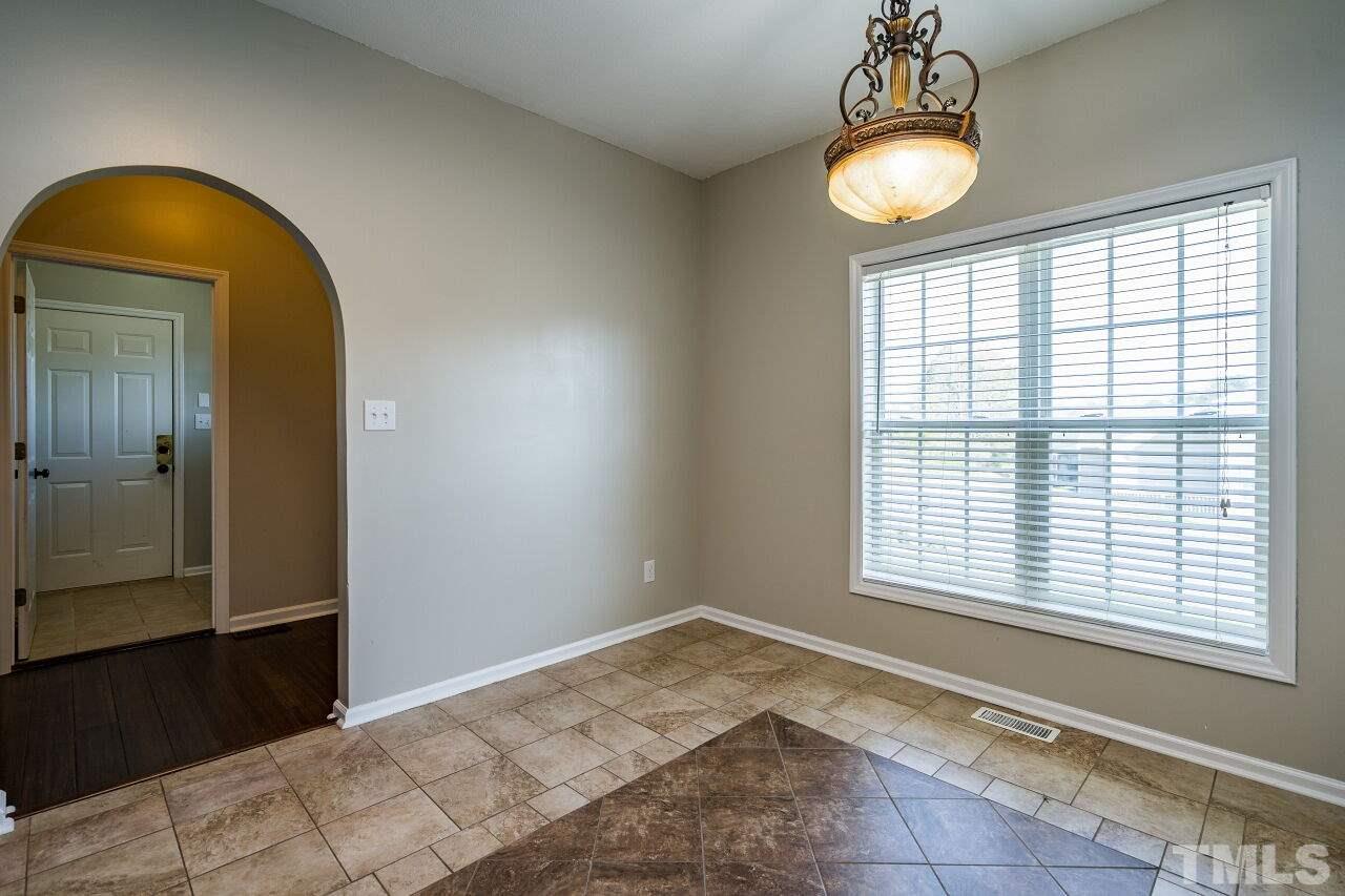 2905 Alder Ridge Lane Raleigh, NC 27603 - Photo 13 of 26 A cozy bistro table will be the perfect addition to this space.