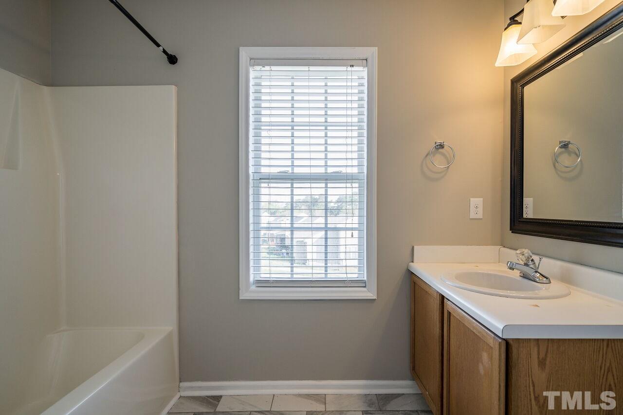2905 Alder Ridge Lane Raleigh, NC 27603 - Photo 21 of 26 This bathroom has a tub/shower combination.