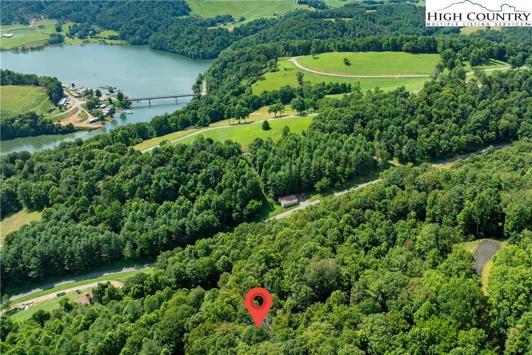 Lot 33 Lake Ridge Butler, TN 37640 - Photo 13 of 30 an aerial view of a house with a yard and lake view