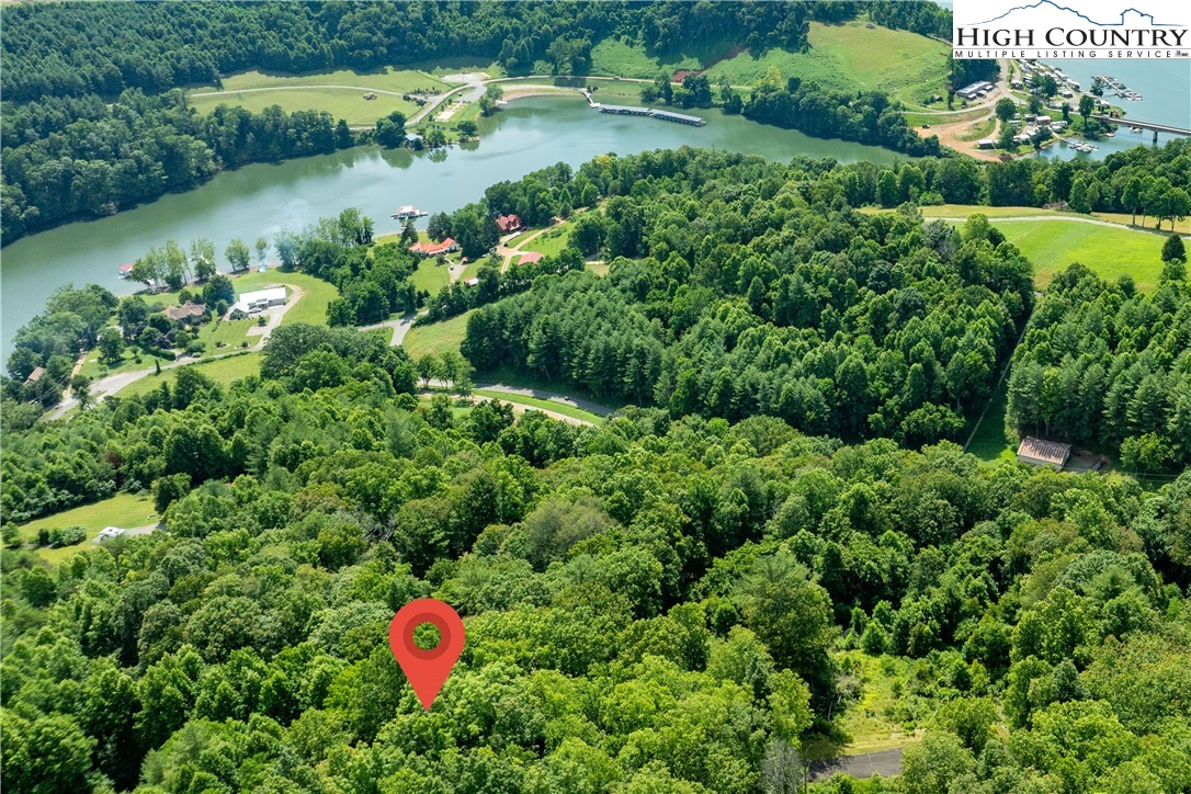 Lot 33 Lake Ridge Butler, TN 37640 - Photo 17 of 30 an aerial view of a house with a yard and lake view