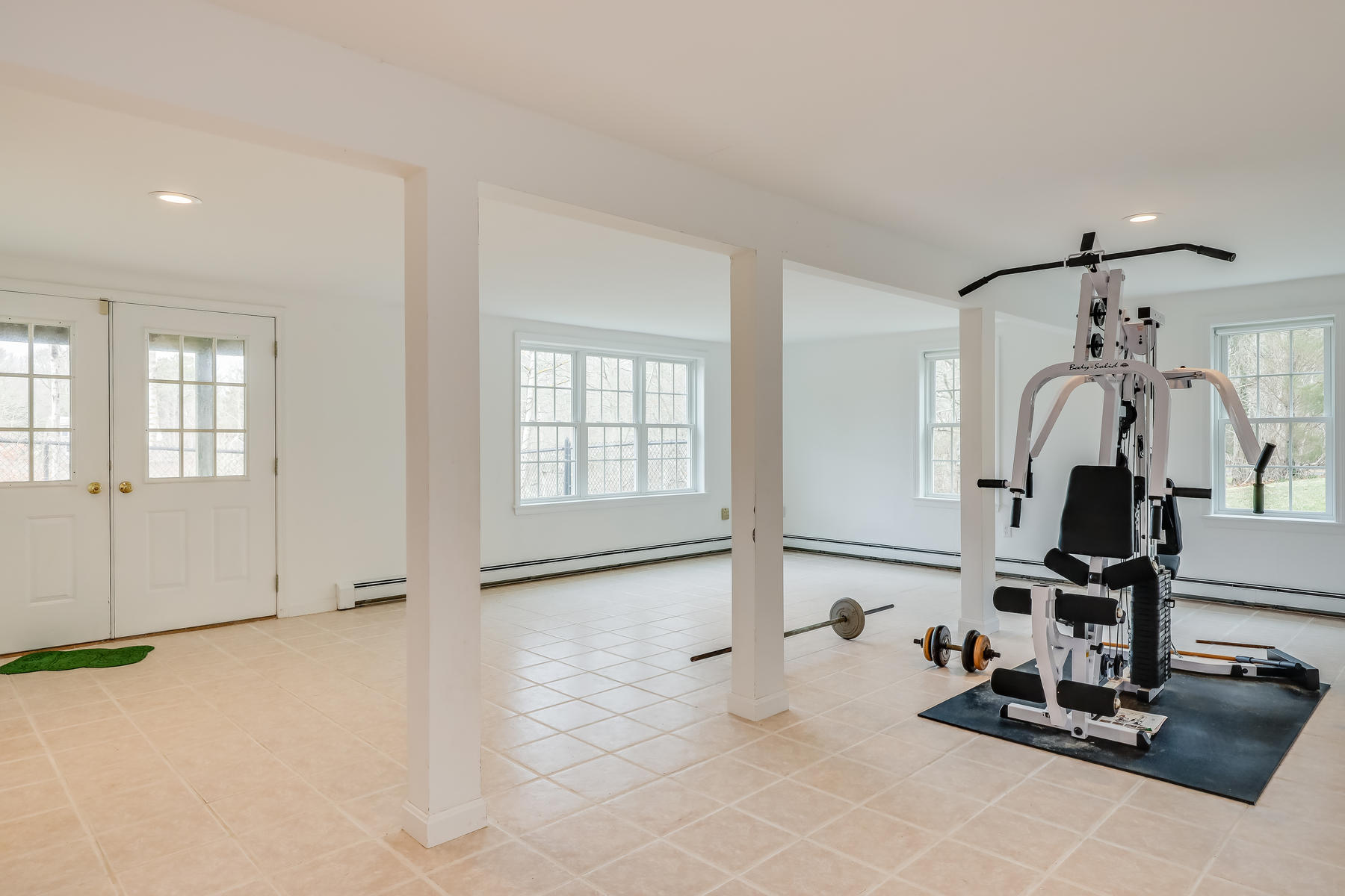 48 Beach Road Orleans, MA 02653 - Photo 31 of 45 a view of a room with gym equipment