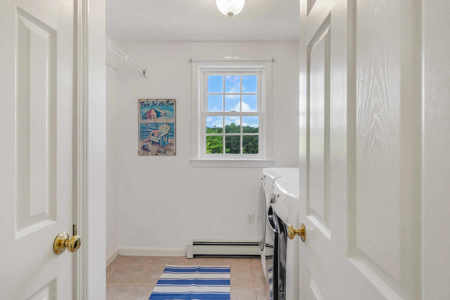 48 Beach Road Orleans, MA 02653 - Photo 6 of 45 a view of entryway with wooden floor