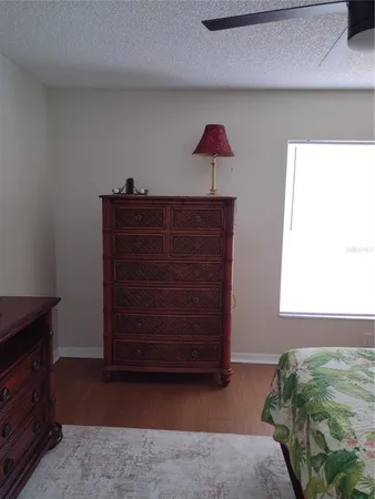 a living room with a dresser