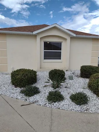 a front view of house with yard