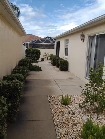 a view of a back yard of the house