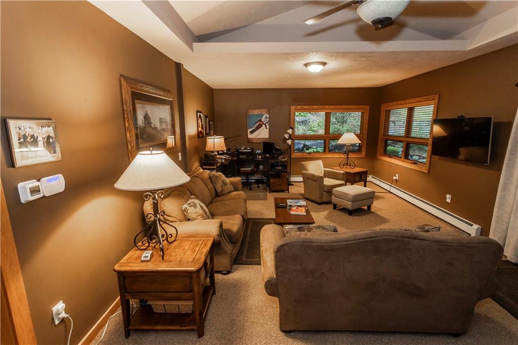 2488 County Line Road Champion, PA 15622 - Photo 14 of 50 a living room with furniture and a flat screen tv