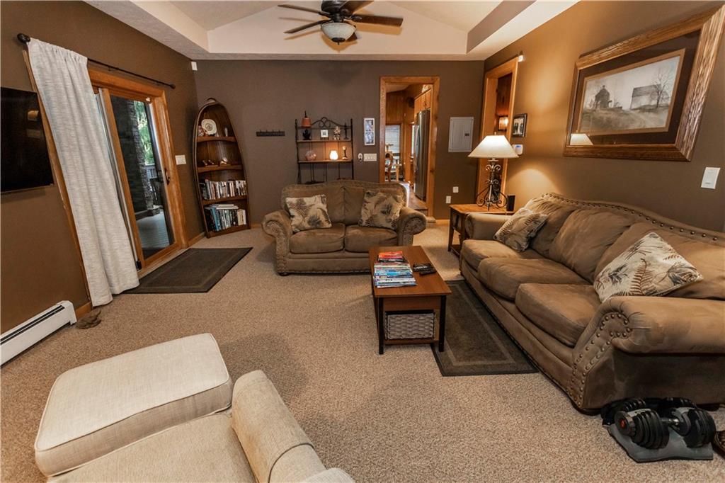 2488 County Line Road Champion, PA 15622 - Photo 16 of 50 a living room with furniture and a flat screen tv