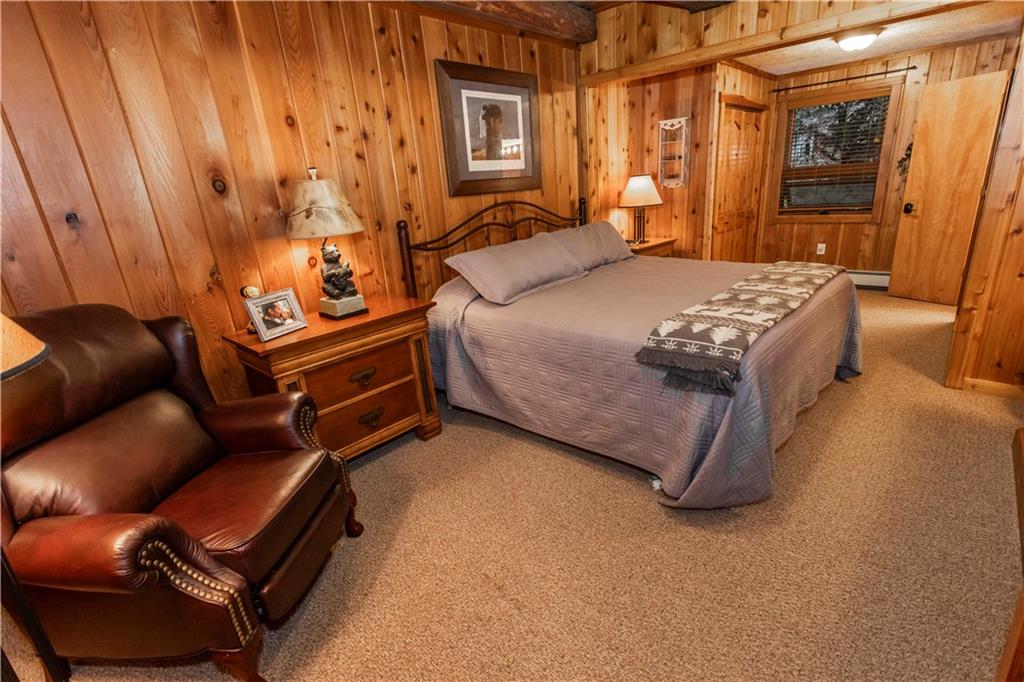 2488 County Line Road Champion, PA 15622 - Photo 18 of 50 a bedroom with a bed chair and a desk