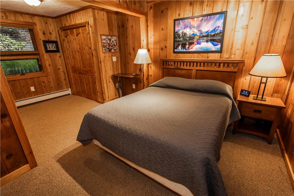 2488 County Line Road Champion, PA 15622 - Photo 21 of 50 a bedroom with a bed and a painting on the wall