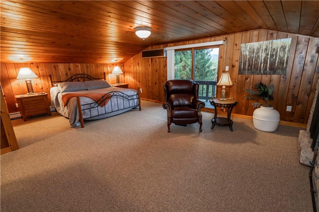 2488 County Line Road Champion, PA 15622 - Photo 26 of 50 a bedroom with furniture and a large window