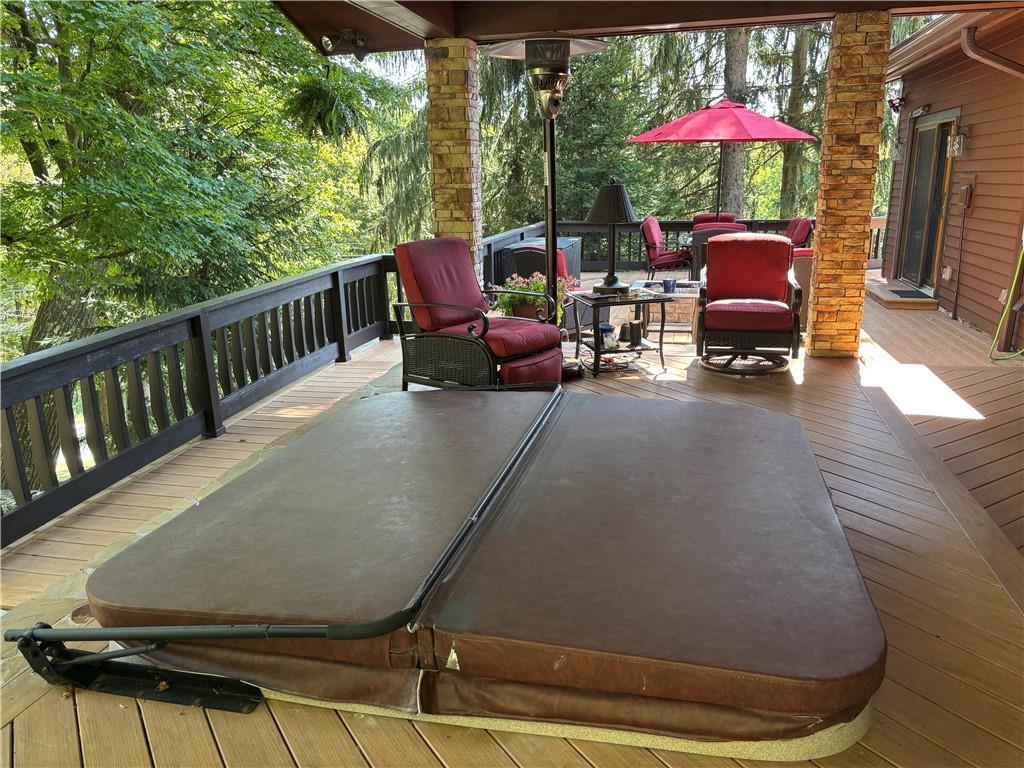 2488 County Line Road Champion, PA 15622 - Photo 37 of 50 a view of balcony with chairs and umbrella