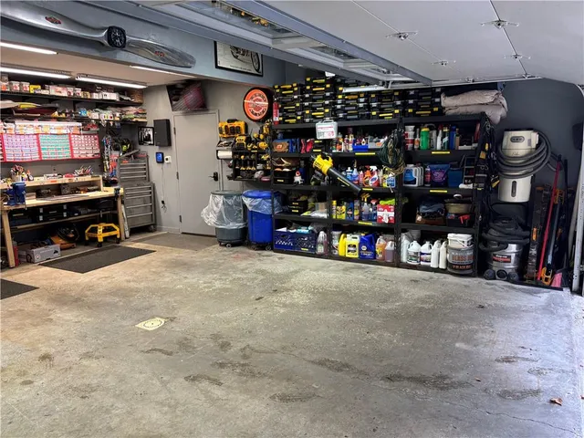 a kitchen with lots of appliances and a sink