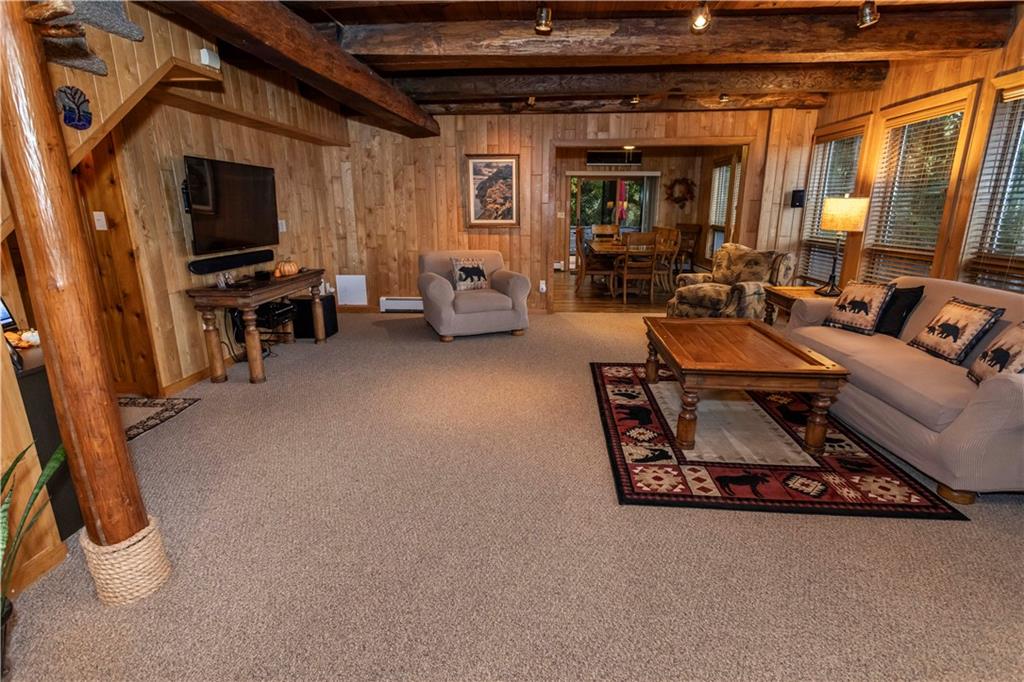 2488 County Line Road Champion, PA 15622 - Photo 5 of 50 a living room with furniture and a flat screen tv