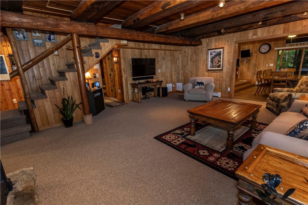 2488 County Line Road Champion, PA 15622 - Photo 6 of 50 a living room with furniture and a flat screen tv