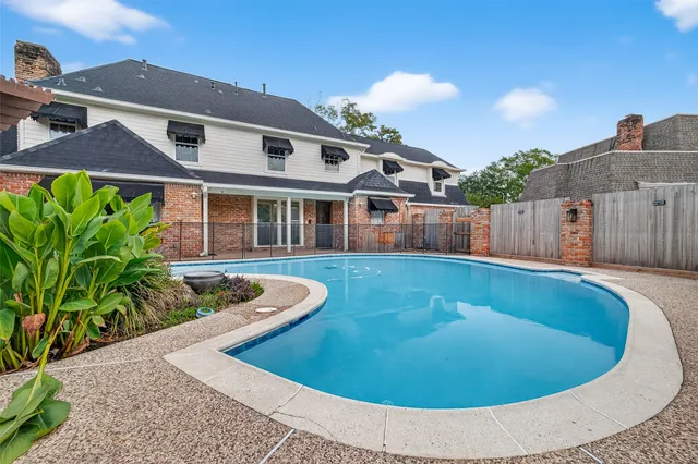 a view of a house with porch and wooden floor
