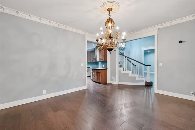 a view of a livingroom with wooden floor