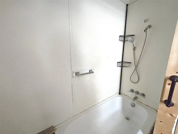 a bathroom with a bathtub