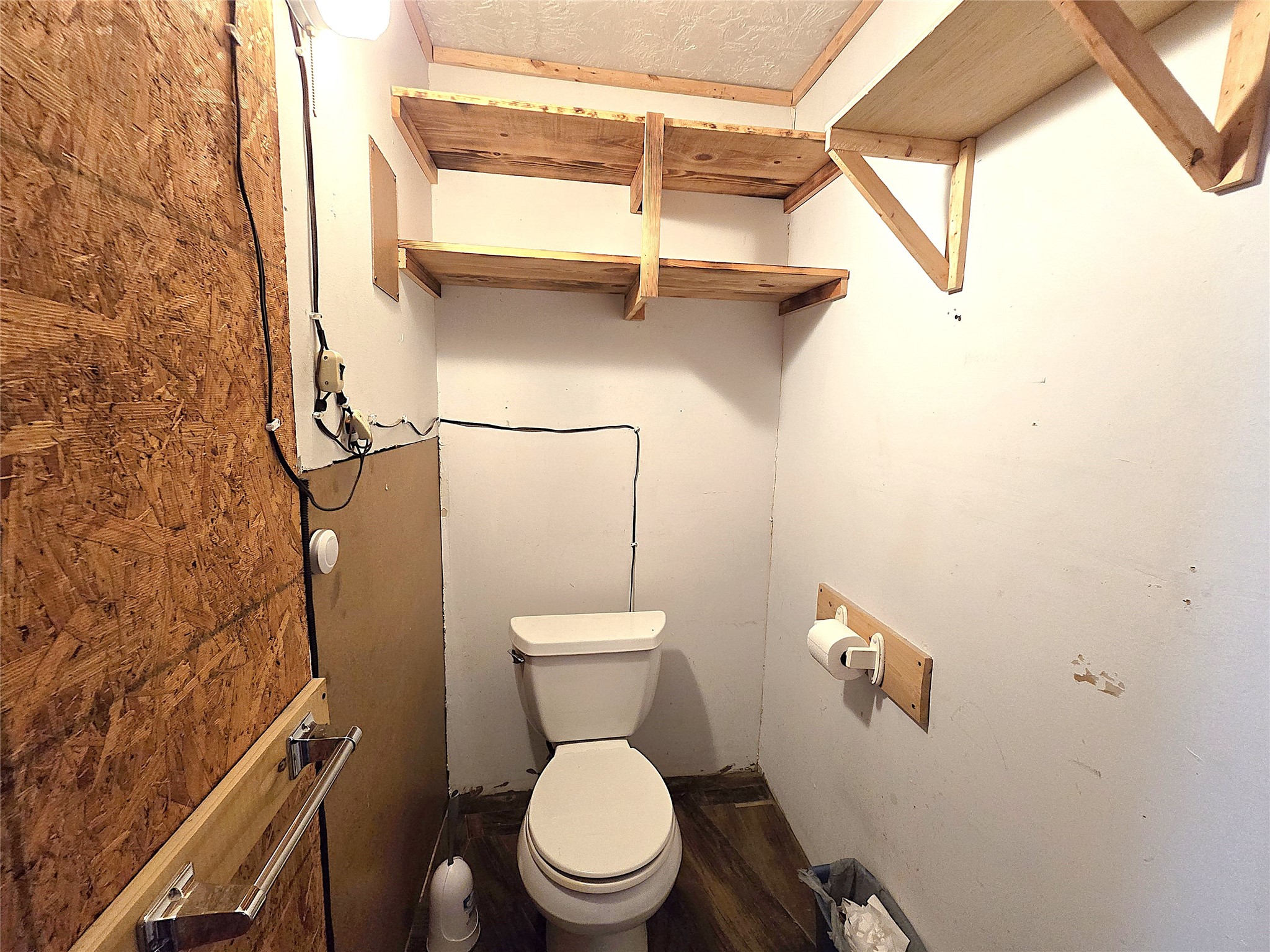 127 Navaho Trail Trinity, TX 75862 - Photo 12 of 12 a white toilet sitting next to a shower