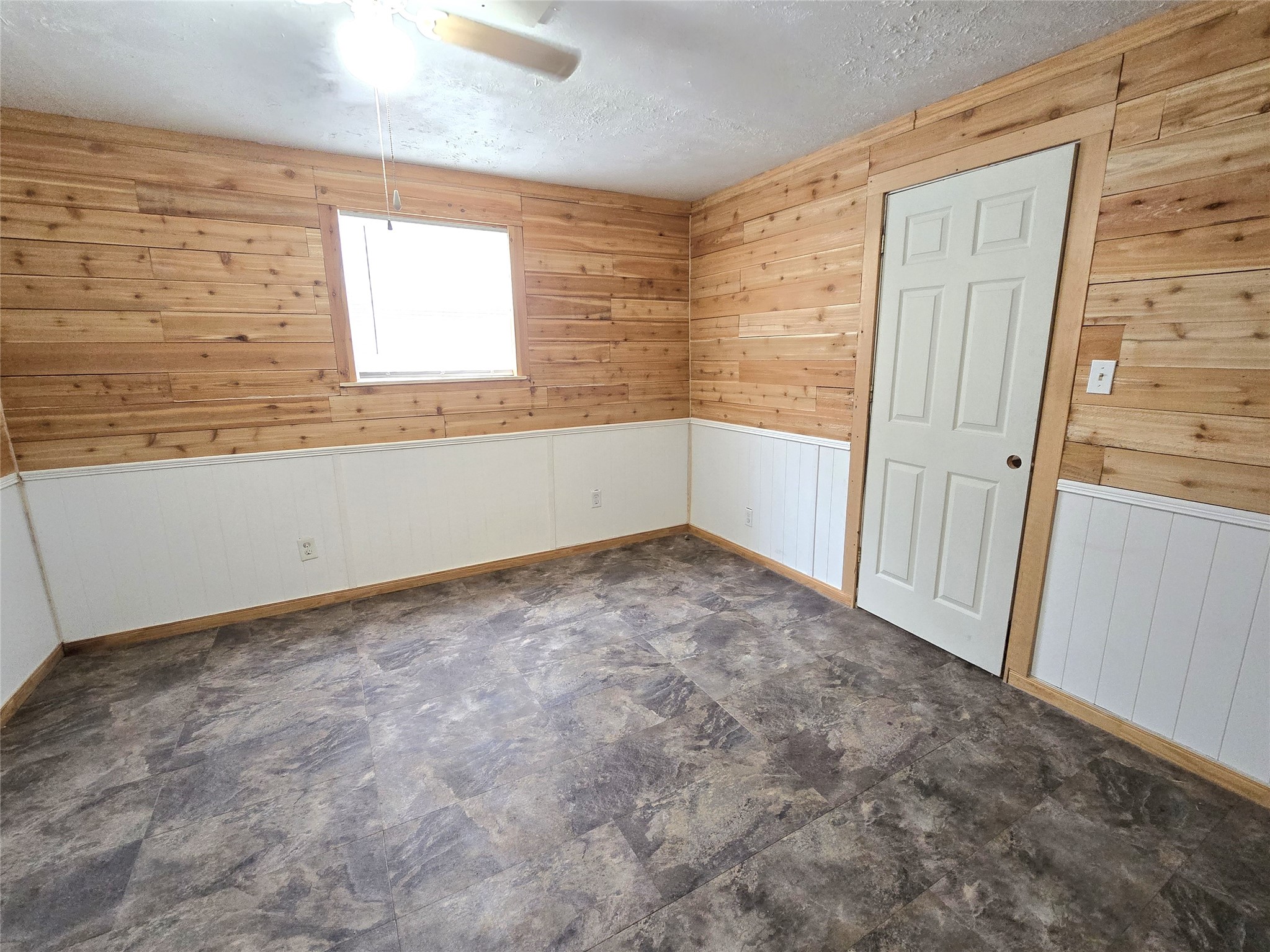 127 Navaho Trail Trinity, TX 75862 - Photo 8 of 13 an empty room with windows