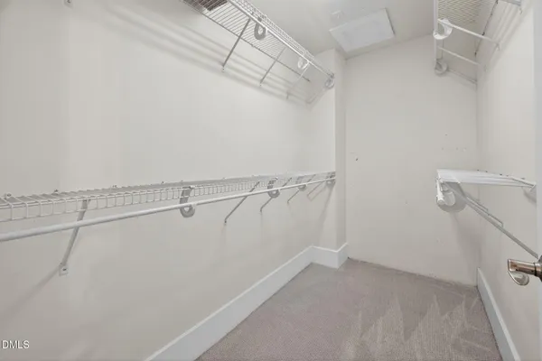 a view of a room with racks on the wall