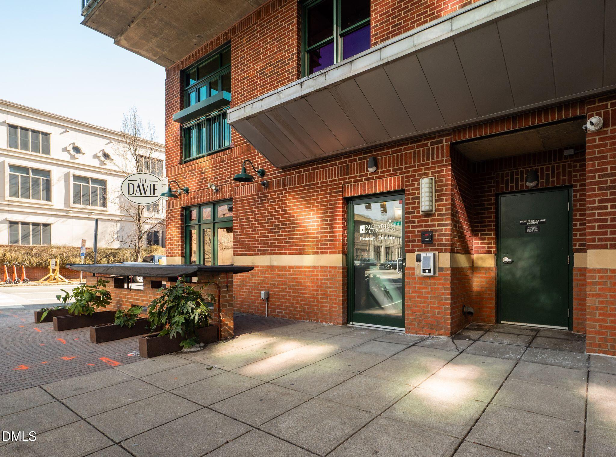 Undisclosed Address Raleigh, NC 27601 - Photo 25 of 25 a view of a brick house with many windows