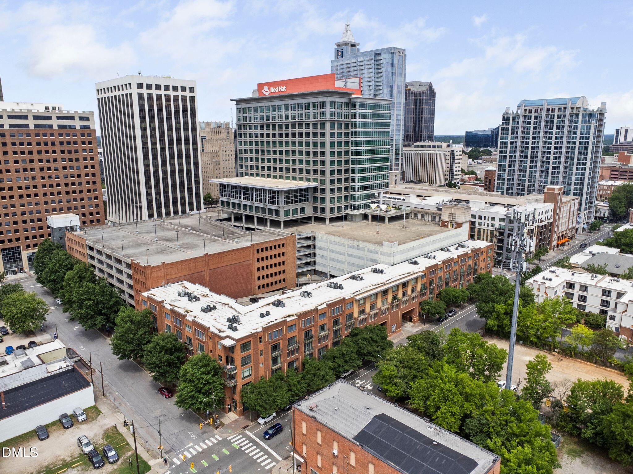 Undisclosed Address Raleigh, NC 27601 - Photo 3 of 25 a view of a city with tall buildings