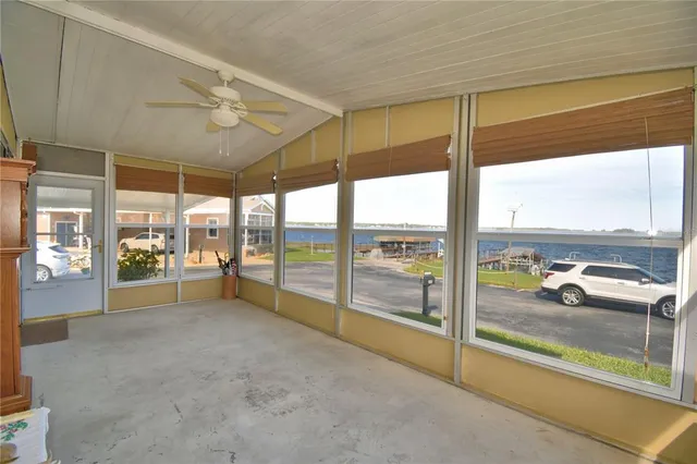 a view of a livingroom with furniture and windows