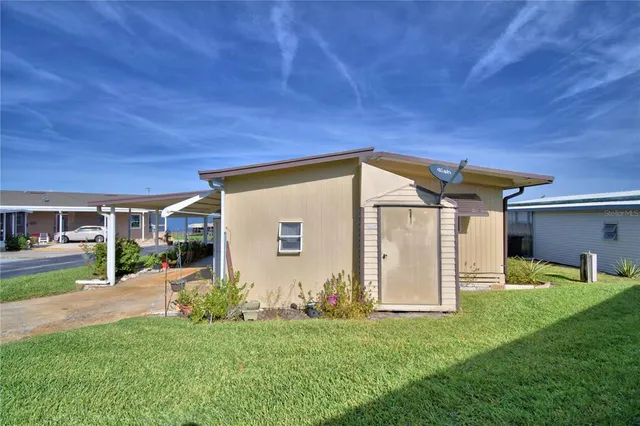 a view of a house with a patio