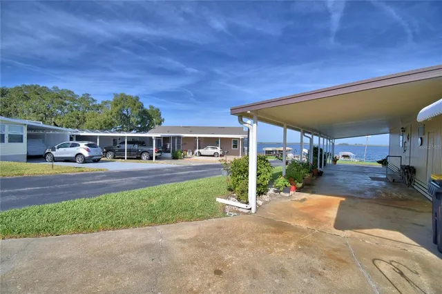 a view of a room with a table and chairs