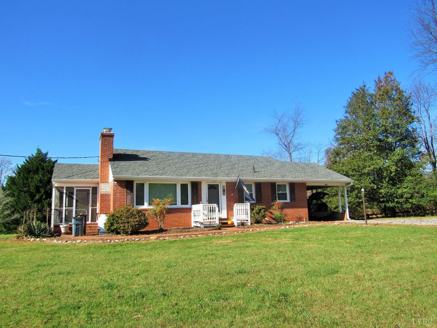 801 Gidsville Road Amherst, VA 24521 - Photo 1 of 34 a front view of a house with a yard table and chairs