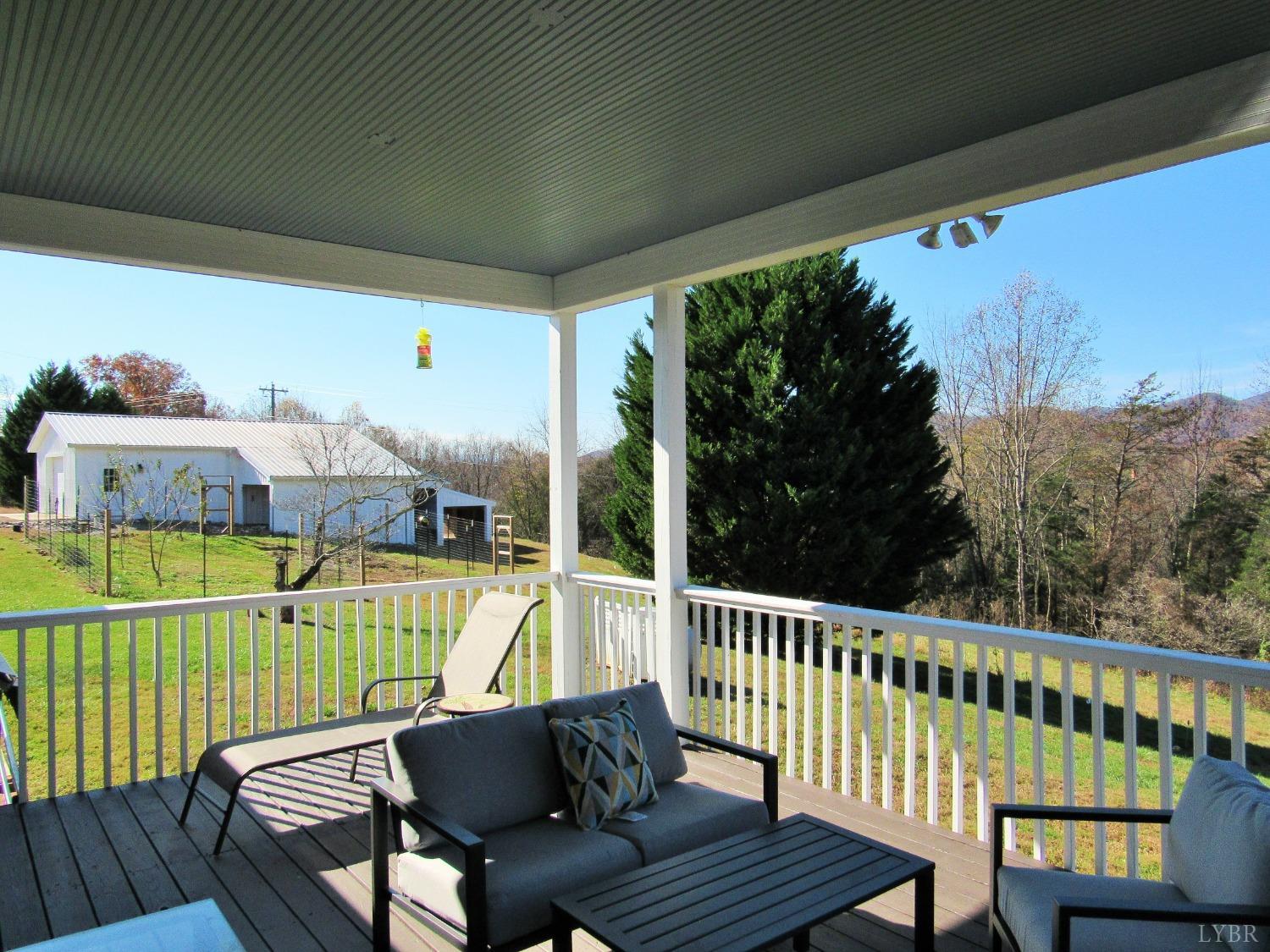 801 Gidsville Road Amherst, VA 24521 - Photo 14 of 34 a view of a chairs in back deck