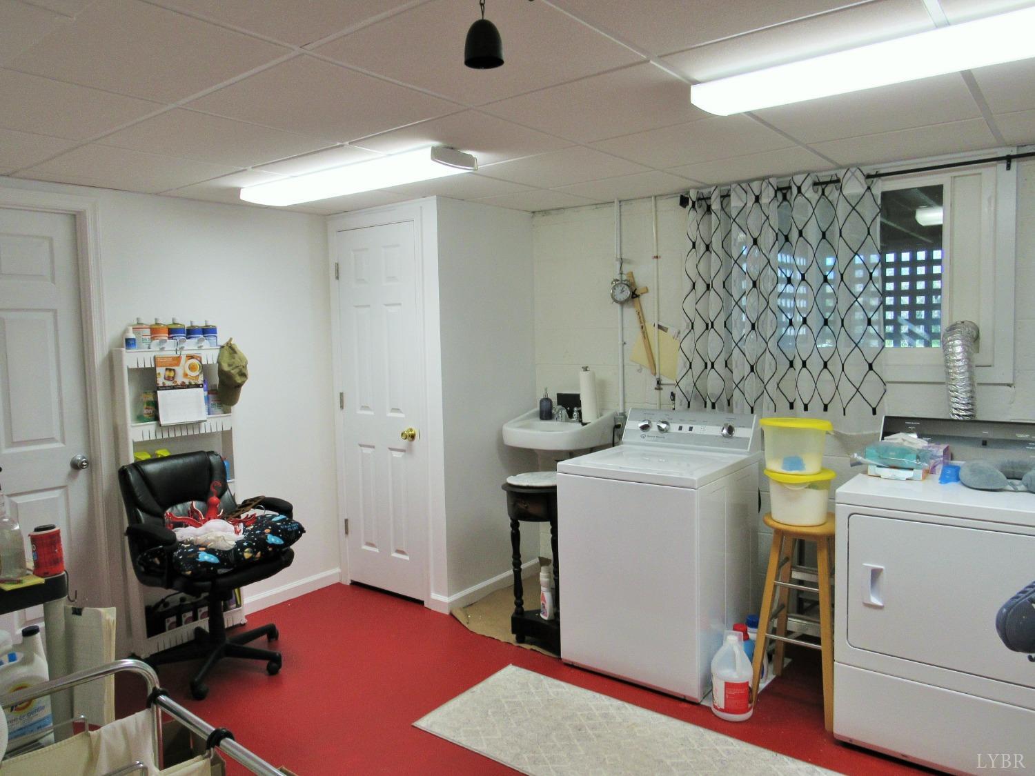 801 Gidsville Road Amherst, VA 24521 - Photo 24 of 34 a storage room with a washer and dryer