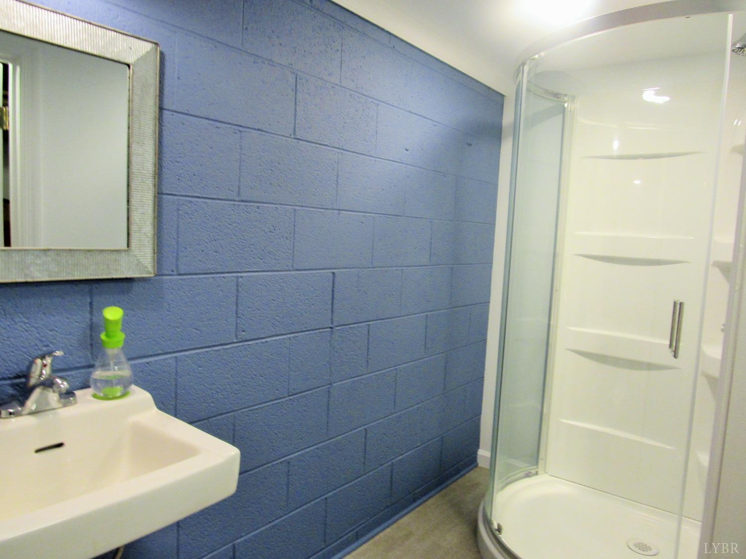 801 Gidsville Road Amherst, VA 24521 - Photo 26 of 34 a bathroom with a sink toilet and shower