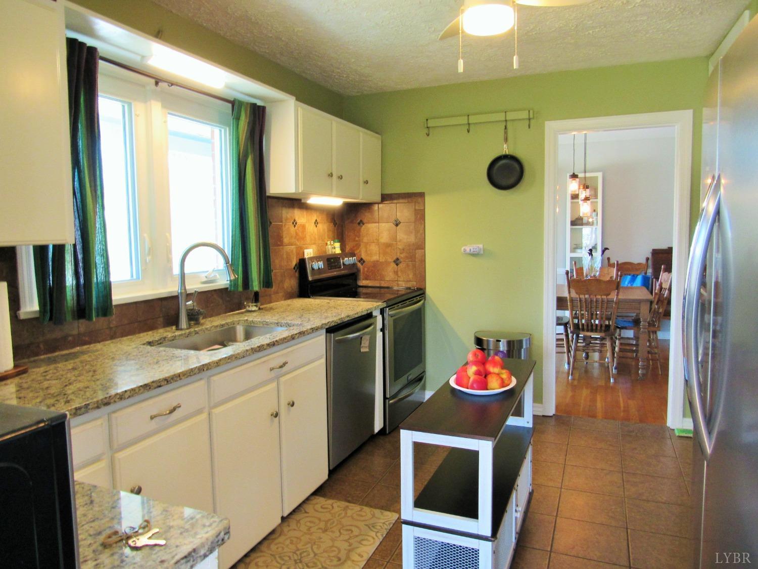801 Gidsville Road Amherst, VA 24521 - Photo 10 of 34 a kitchen with cabinets and a sink