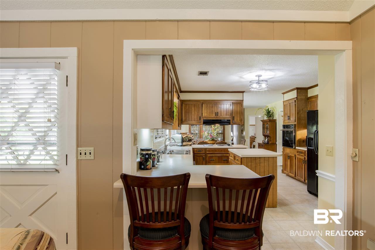 113 Fernway Drive Atmore, AL 36502 - Photo 13 of 25 Kitchen/Den Bar