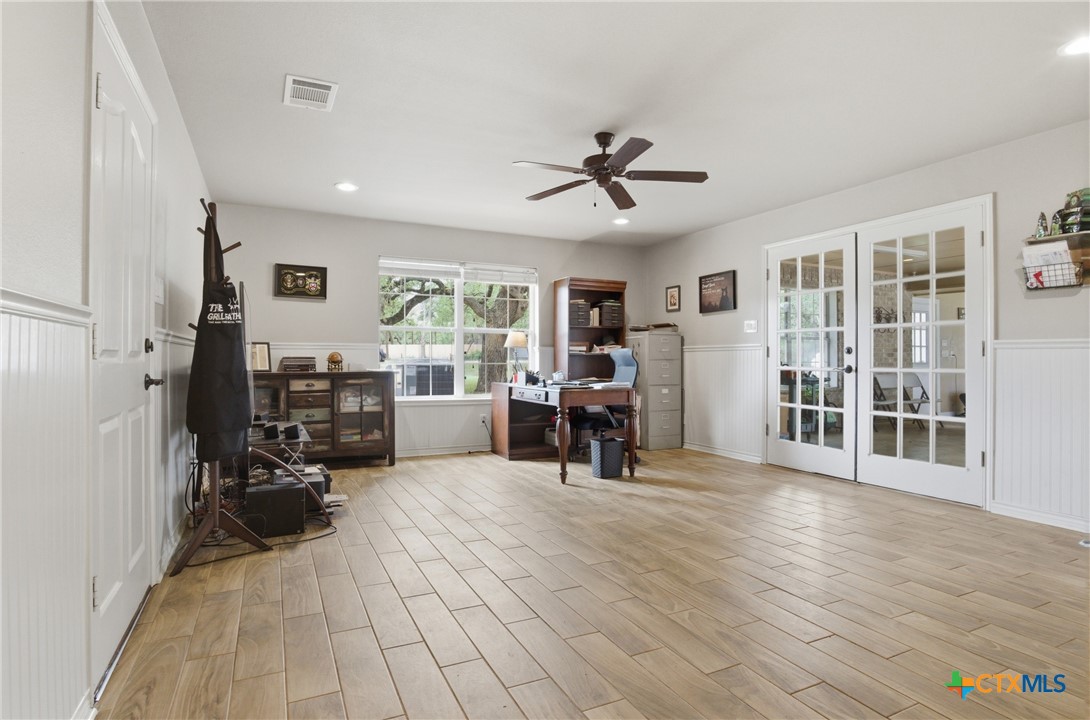 642 Phantom Rider Trail Spring Branch, TX 78070 - Photo 19 of 41 a view of a livingroom with furniture and a window