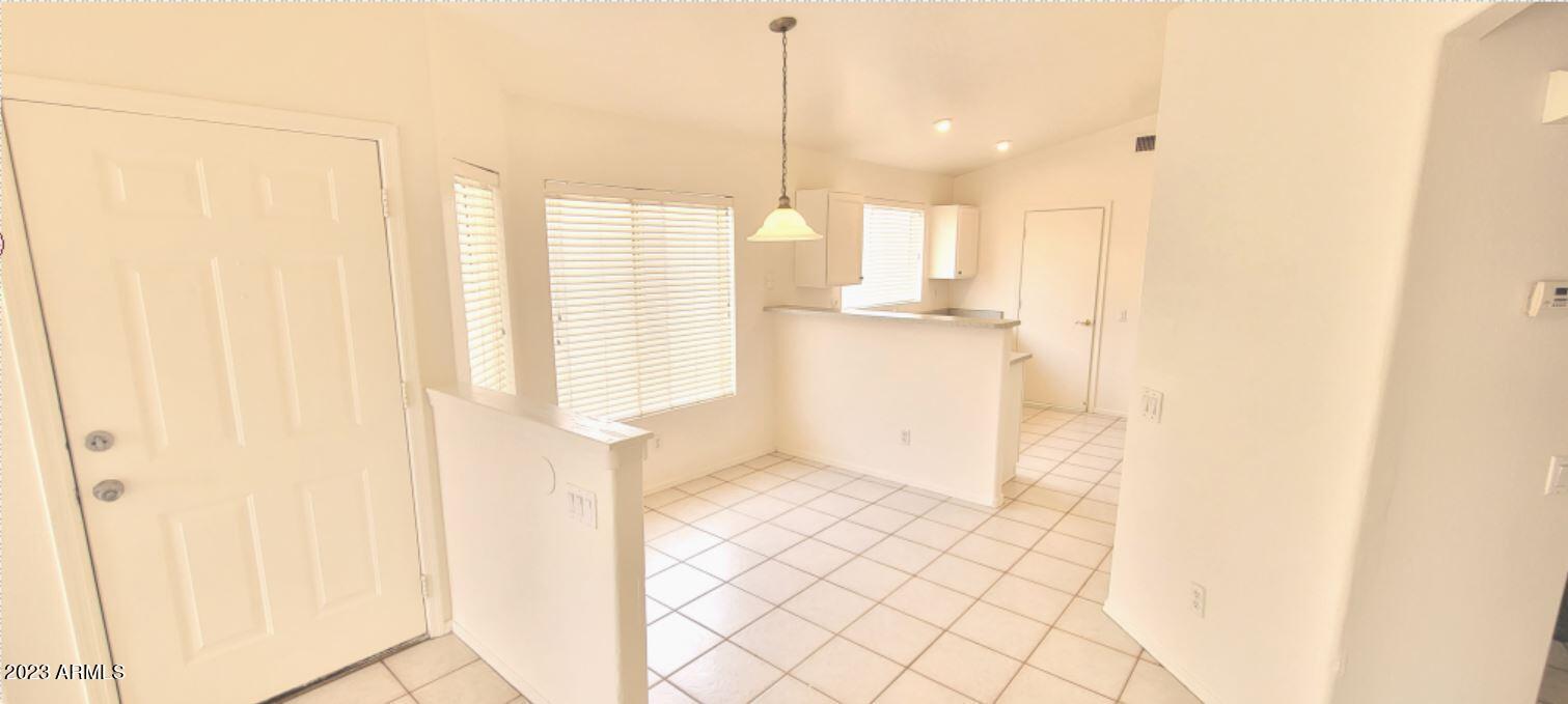 1202 North Bogle Avenue Chandler, AZ 85225 - Photo 4 of 16 a view of a room with a window
