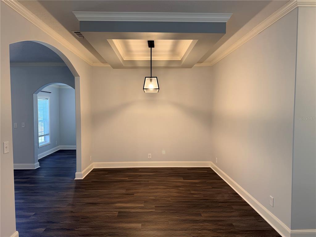 4440 Southwest 63rd Boulevard Gainesville, FL 32608 - Photo 21 of 49 a view of a room with wooden floor