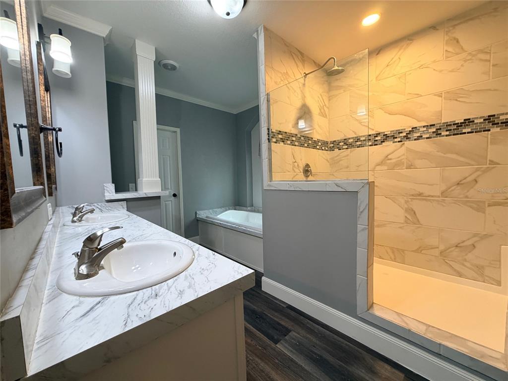 4440 Southwest 63rd Boulevard Gainesville, FL 32608 - Photo 26 of 49 a bathroom with a sink and a mirror