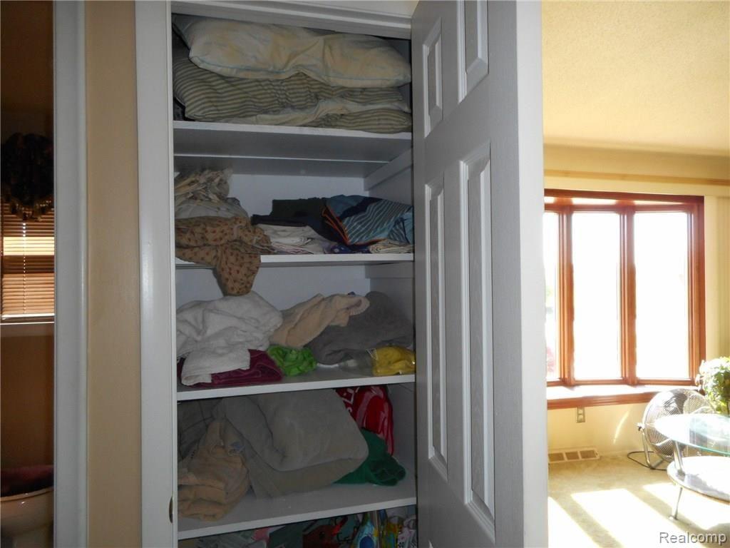 17544 Clark Street Riverview, MI 48193 - Photo 47 of 61 HALL WAY LINEN CLOSET