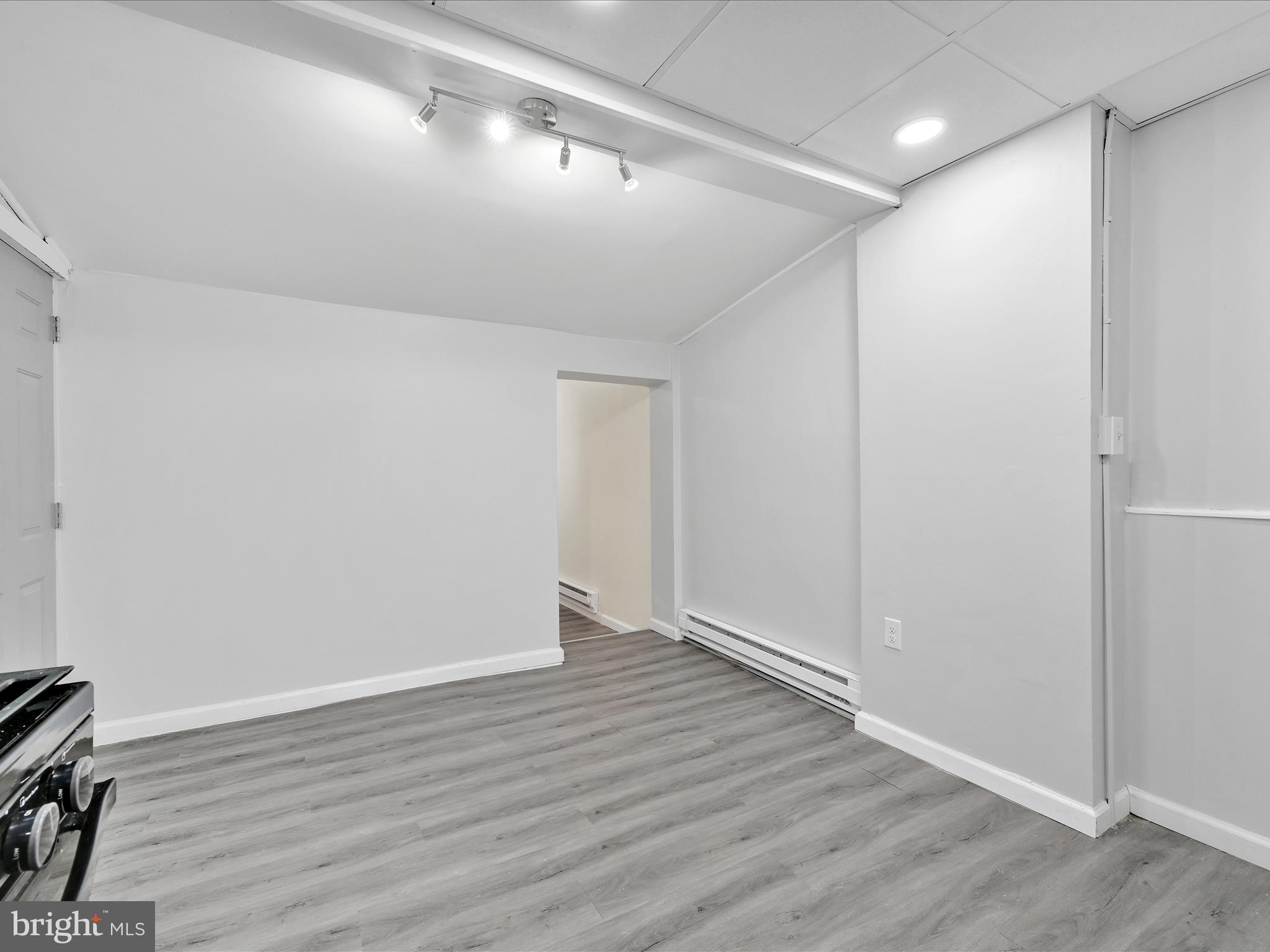 1253 Green Street Reading, PA 19604 - Photo 13 of 26 wooden floor in an empty room