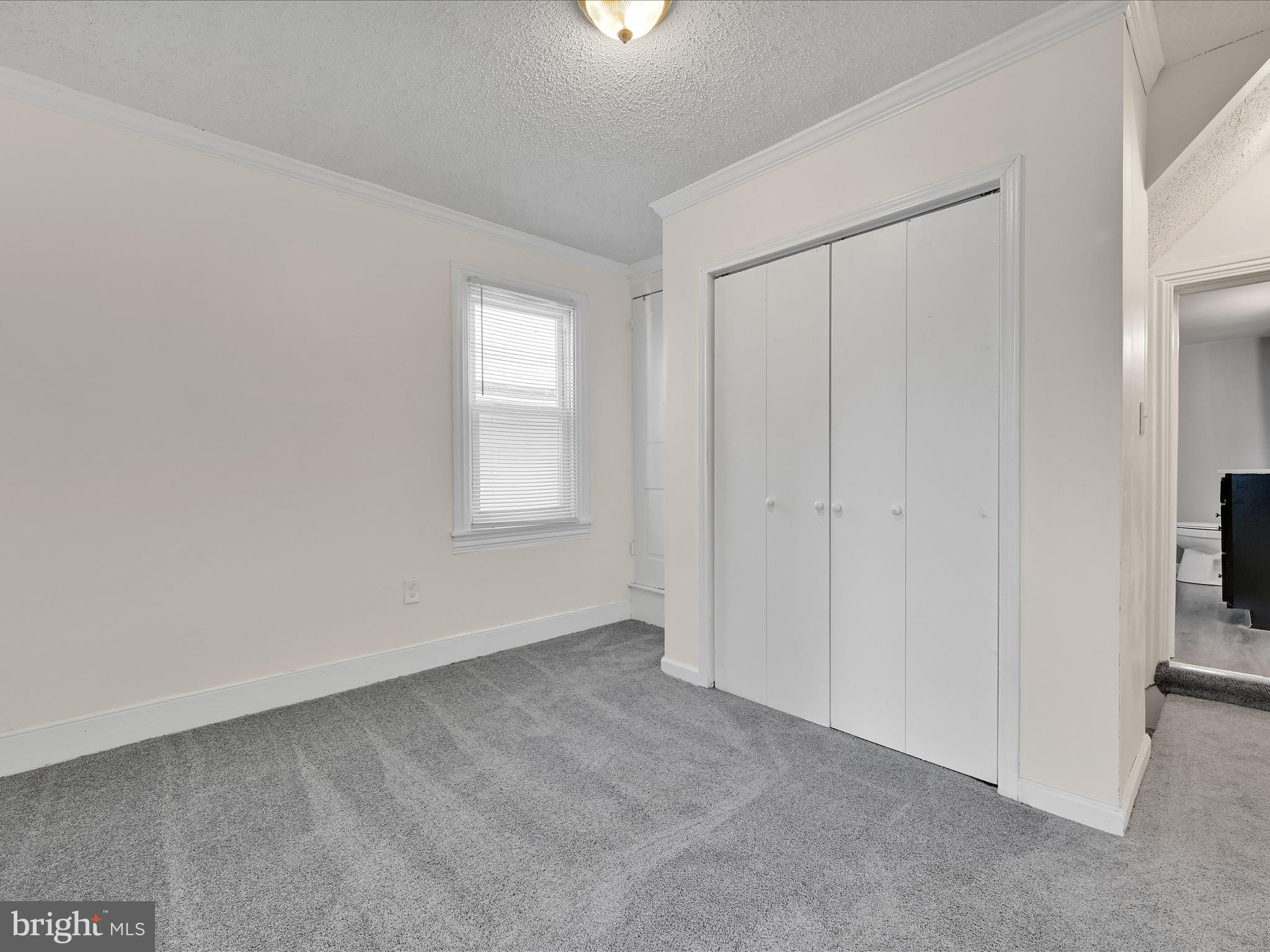 1253 Green Street Reading, PA 19604 - Photo 15 of 26 a view of an empty room with a window