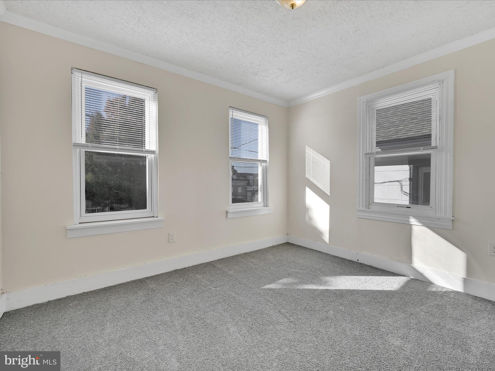 1253 Green Street Reading, PA 19604 - Photo 16 of 26 a view of empty room with windows