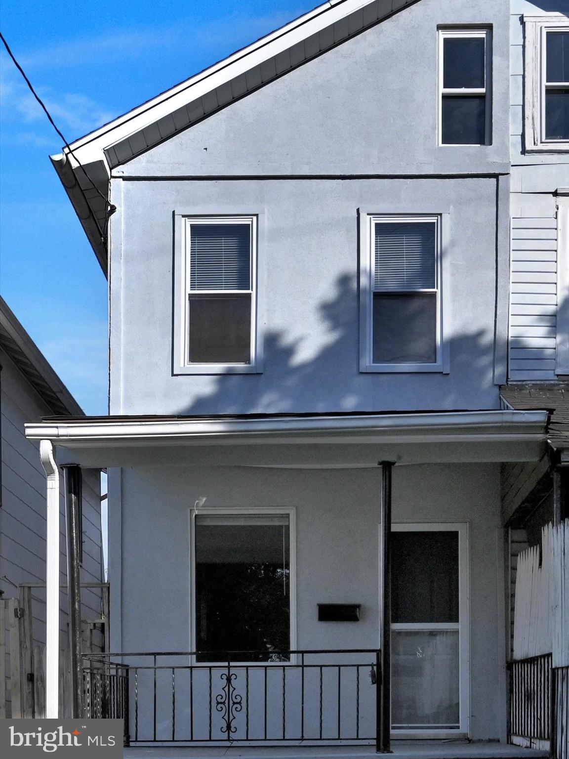 1253 Green Street Reading, PA 19604 - Photo 2 of 26 a front view of a house with a garage