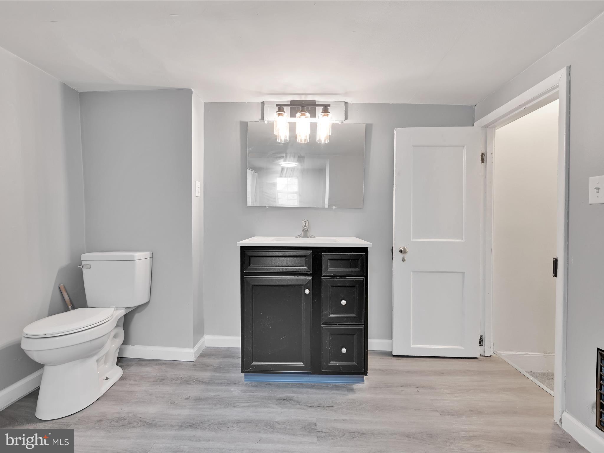 1253 Green Street Reading, PA 19604 - Photo 24 of 26 a bathroom with a toilet and a sink