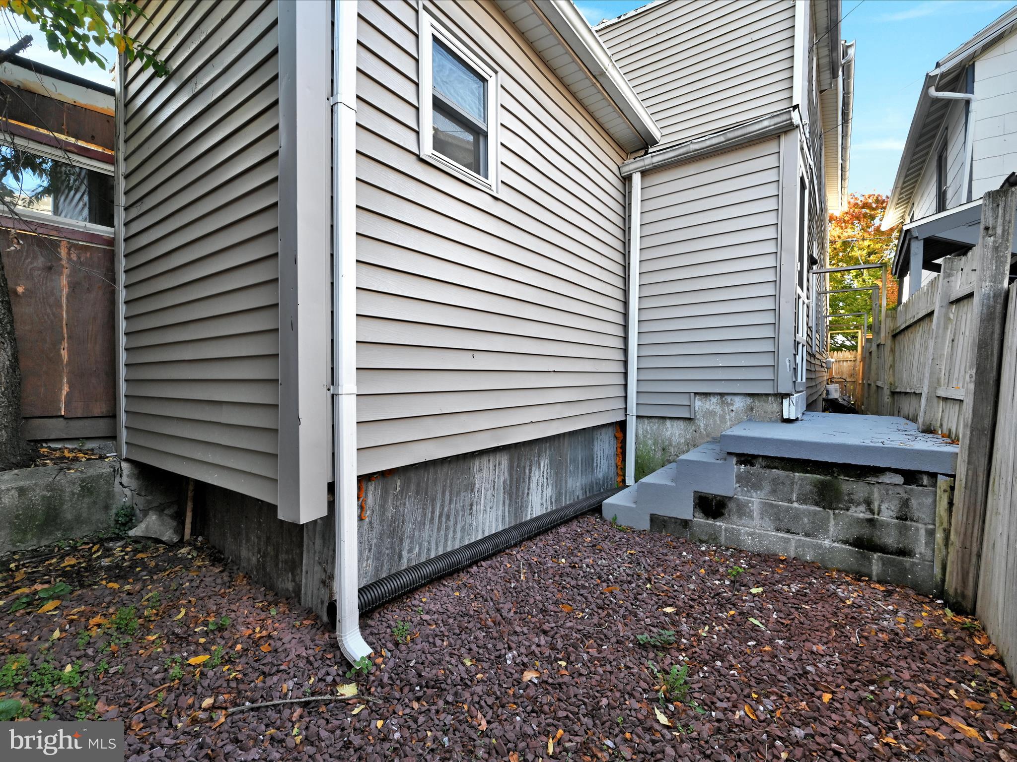 1253 Green Street Reading, PA 19604 - Photo 26 of 26 a view of a small house with a yard and outdoor seating