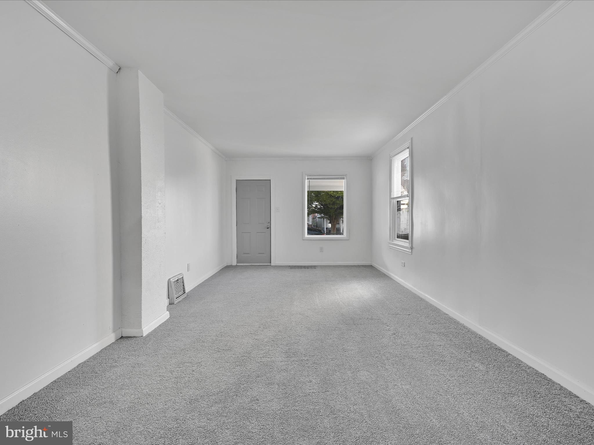 1253 Green Street Reading, PA 19604 - Photo 7 of 26 a view of an empty room with a window