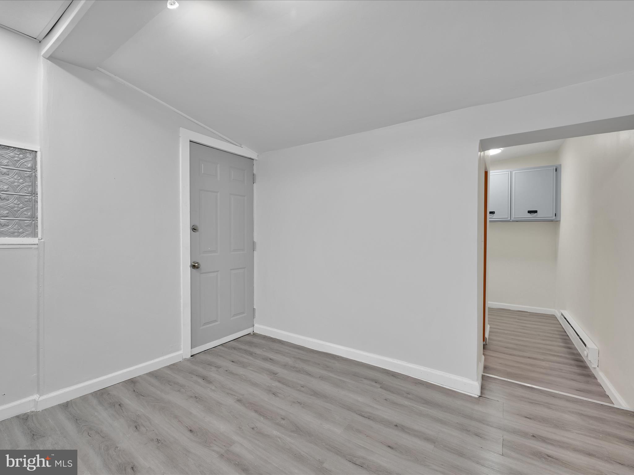 1253 Green Street Reading, PA 19604 - Photo 8 of 26 a view of an empty room with wooden floor