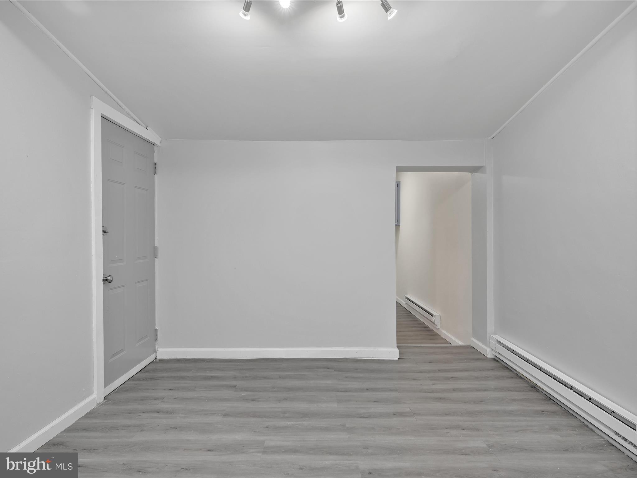 1253 Green Street Reading, PA 19604 - Photo 9 of 26 a view of an empty room with wooden floor